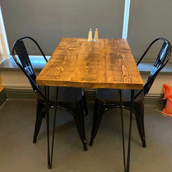 Trudell Rustic Dining Table in Brown Color with Black Chairs