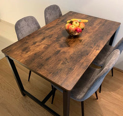 Langford Rustic Dining Table & Chairs with Fruits on it
